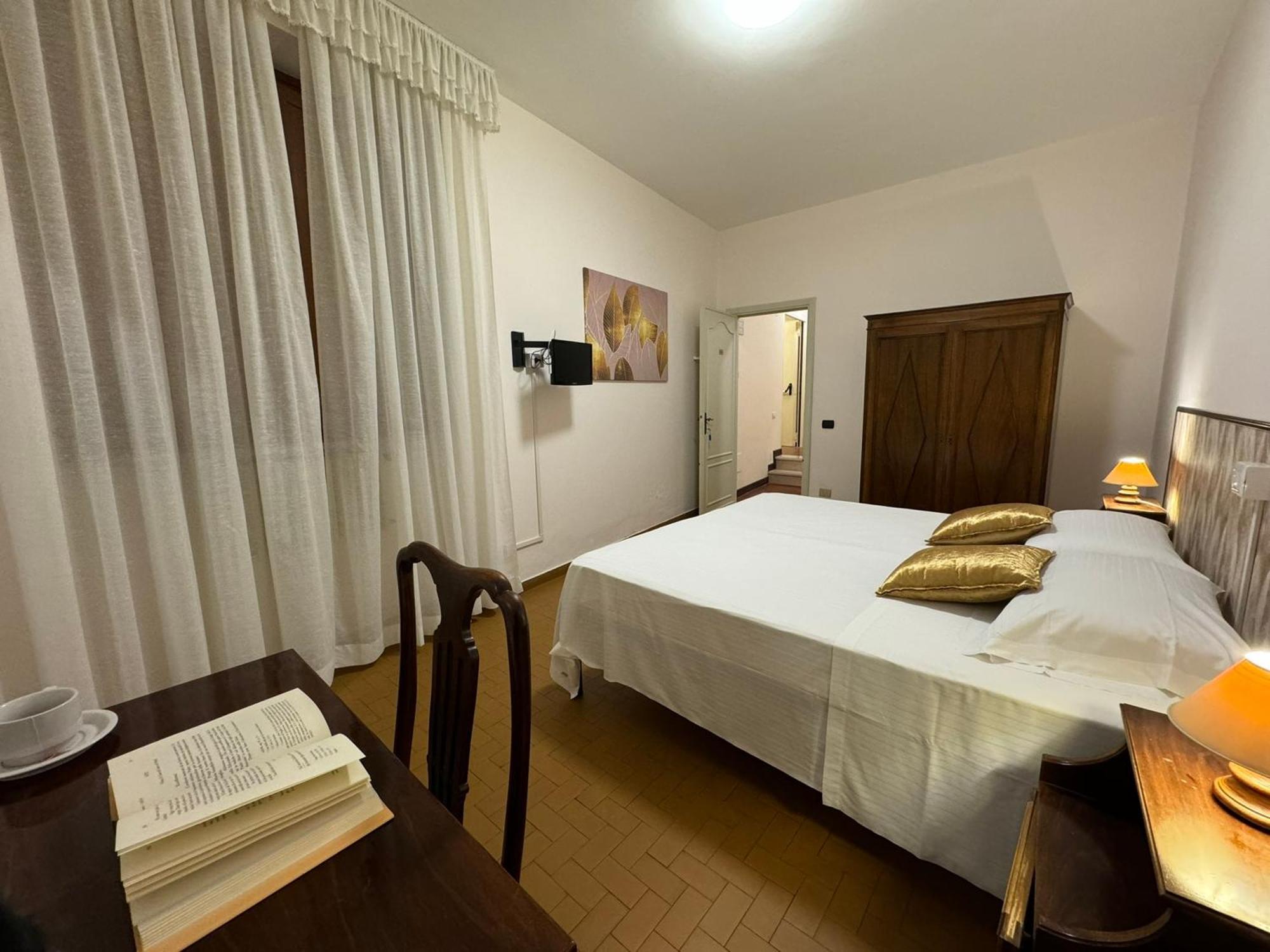 Hotel Monastero Ss. Annunziata Todi Pokój zdjęcie A bedroom in Italy